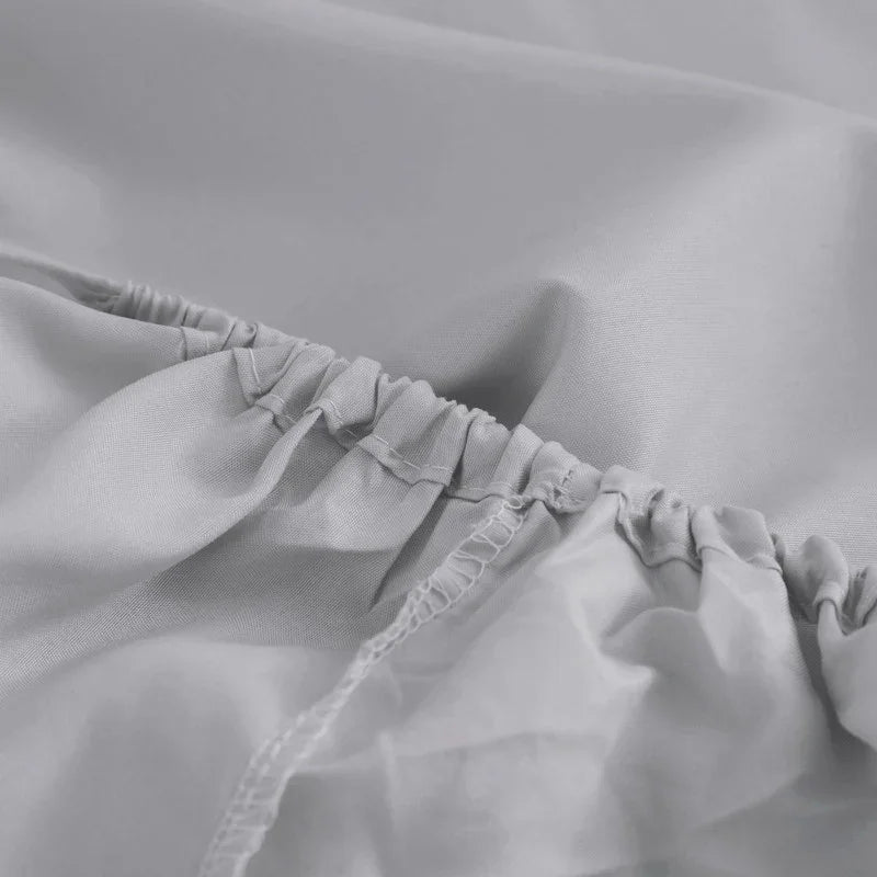 Sábana bajera ajustable gris